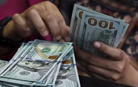 الدولار يرتفع بشكل طفيف قبيل اجتماع الفيدرالي وبنك اليابان يثبت سياسته